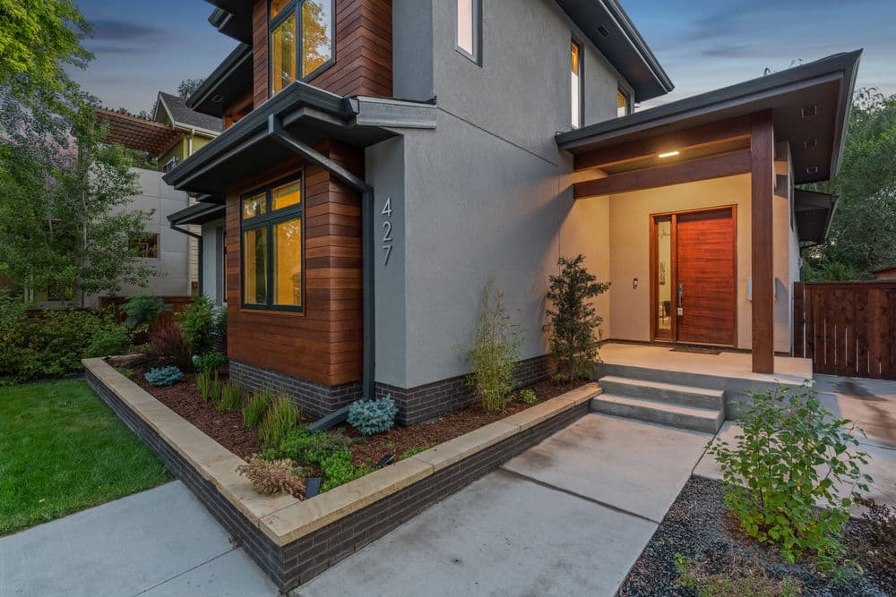 Modern home exterior with landscaped garden and welcoming entrance at 427.